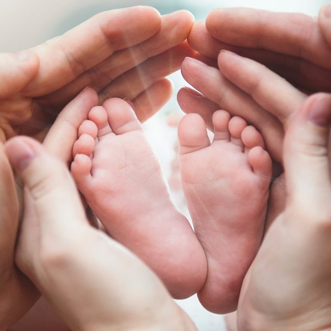 baby-feet-in-the-parent-hands-2022-10-31-21-48-13-utc